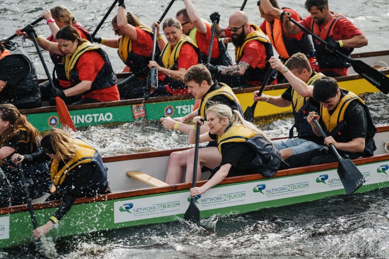 Rowers paddling in a Dragon Boat Race